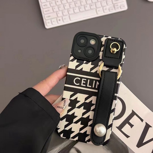 Celine ブランド iphone 14/14 pro/14 pro maxケース セリーヌ 激安 ハンドバンド付 レザー製 リング モノグラム 黒白色 アイフォン14/13/12/11/x/xs/xs max/xrカバー ファッション メンズ レディース