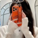 Hermes/エルメス iphone14/14 pro/14 pro maxケース リング付 ブランド 馬車柄 ハンドバンド付き スタンド機能 モノグラム ジャケット型 アイフォン14/14プロ/14プロマックス/13/12/11カバー 大人気 メンズ レディース