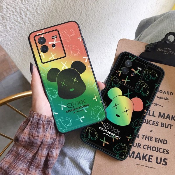 Kaws ブランド iphone se3/13/13 pro/13 pro max/13 miniケース モノグラム 彩色 熊頭柄 カウズ 全機種対応 Galaxy a53/S22/s22+/s22 ultra/note21ケース ジャケット型 Xperia 1/10 IV/aceiiI/pro-i/5iii/10iii/カバー 大人気 メンズ レディーズ 