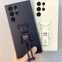 Kaws カウズ Be@rbrick ベアブリック ブランド Galaxy S23/S23 Plus/S23 Ultraケース 激安 スタンド機能 熊柄 モノグラム iPhone 14/14 Pro/14 Pro Max/13/12/11スマホケース tpu ジャケット型 ギャラクシーs23/s23プラス/s23ウルトラ/S22/S21/S20/S10/Note20/Note10カバー 芸能人愛用 メンズ レディース