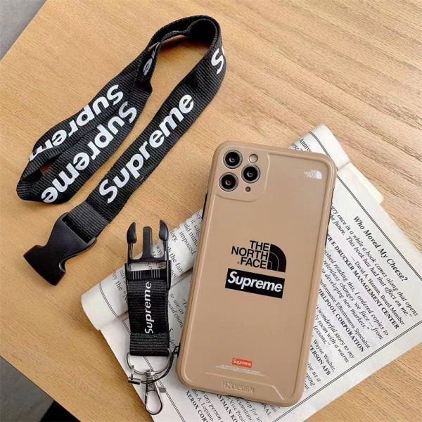 The North Face Supreme コラボ ブランド iPhone 14/14 Pro/14 Pro maxケース 激安 シュプリーム ザノースフェイス 個性 チェーン付き モノグラム ジャケット型 アイフォン14プロ マックス/14/13/12/11カバー 大人気 メンズ レディース